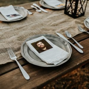 Square photo print being used as a wedding place card